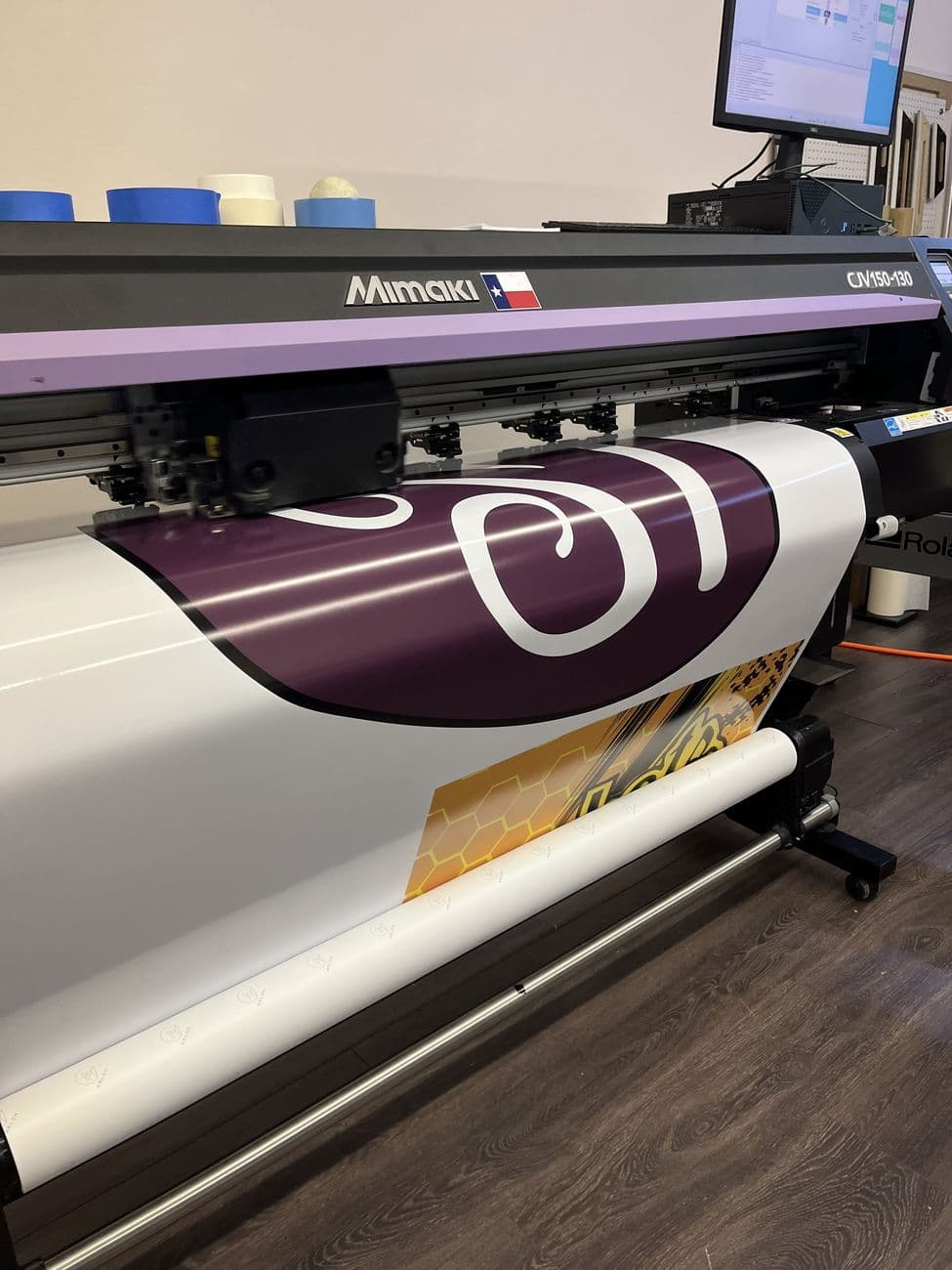 Our press printing a Moxie logo panel