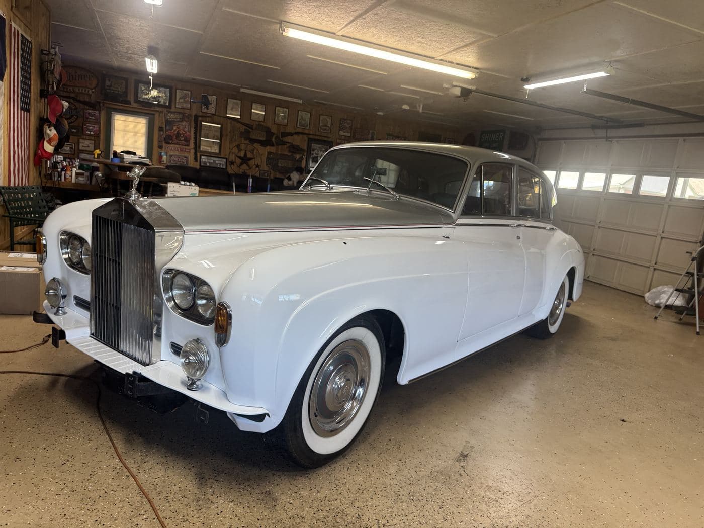 Rolls-Royce Silver Cloud in white vinyl over green paint